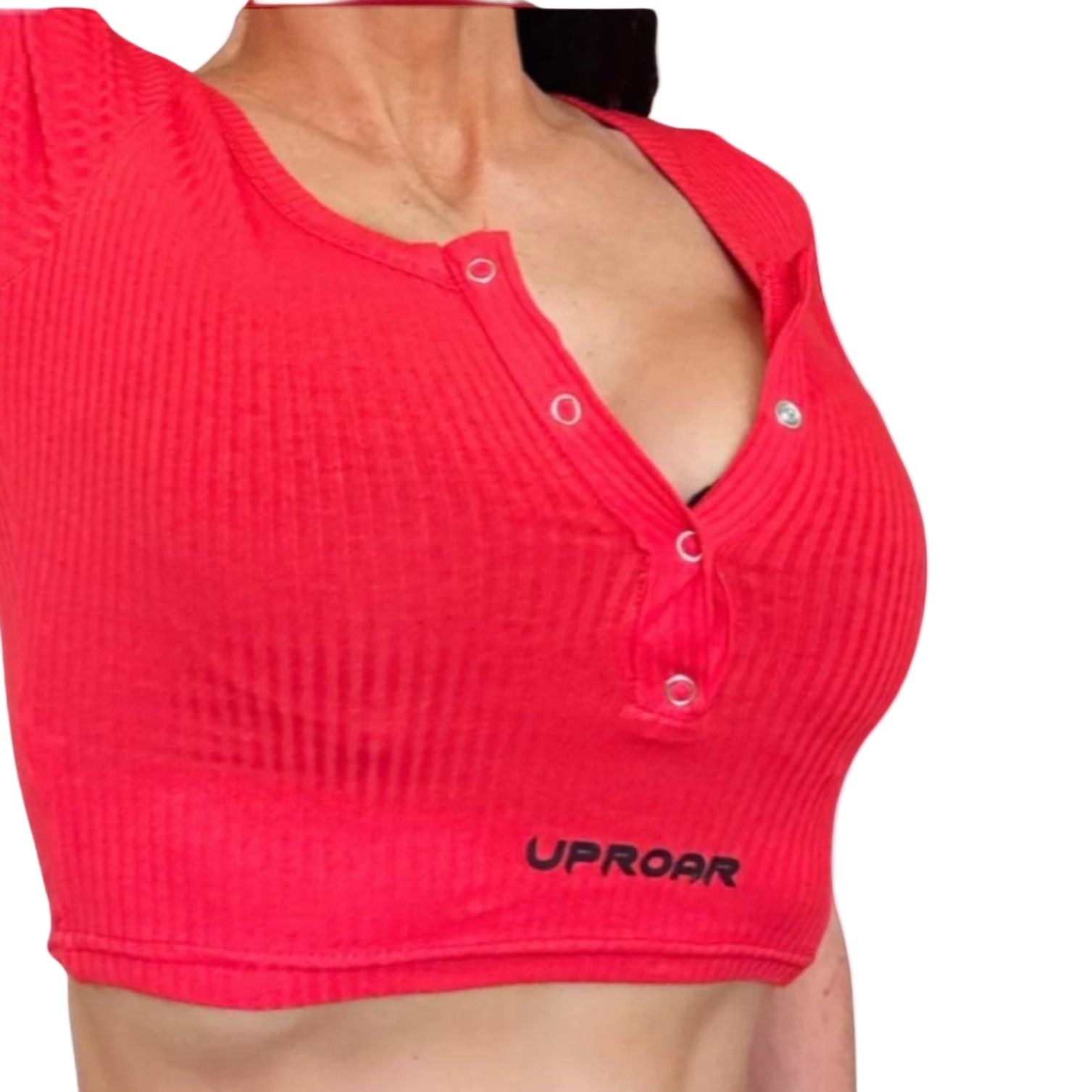 basic red crop top with light ribbing, button holes down the neck opening, short sleeve and light weight