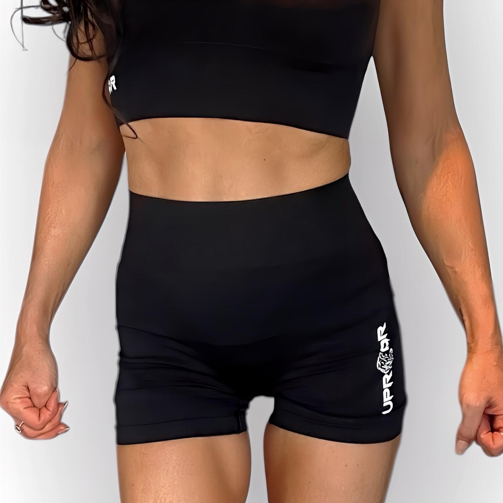 Black ribbed biker shorts for women, high waist for core support, compression fit, contrasting white logo, squat proof and camel toe proof, seamless, durable material