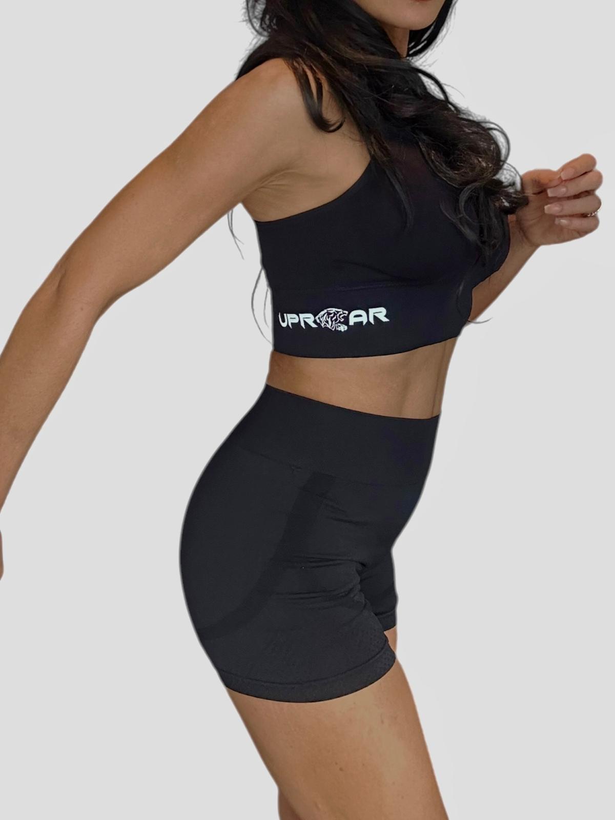 Black ribbed biker shorts for women, high waist for core support, compression fit, contrasting white logo, squat proof and camel toe proof, seamless, durable material