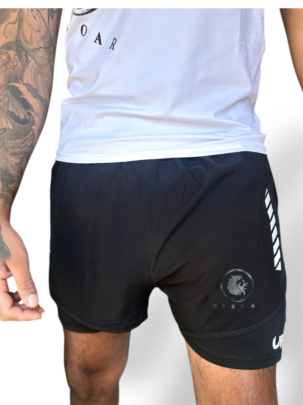 mens black 2n1 training shorts, lightweight with drawstring and elastic waist, no pockets or zips for use in combat training, reflective logo for visibility at night