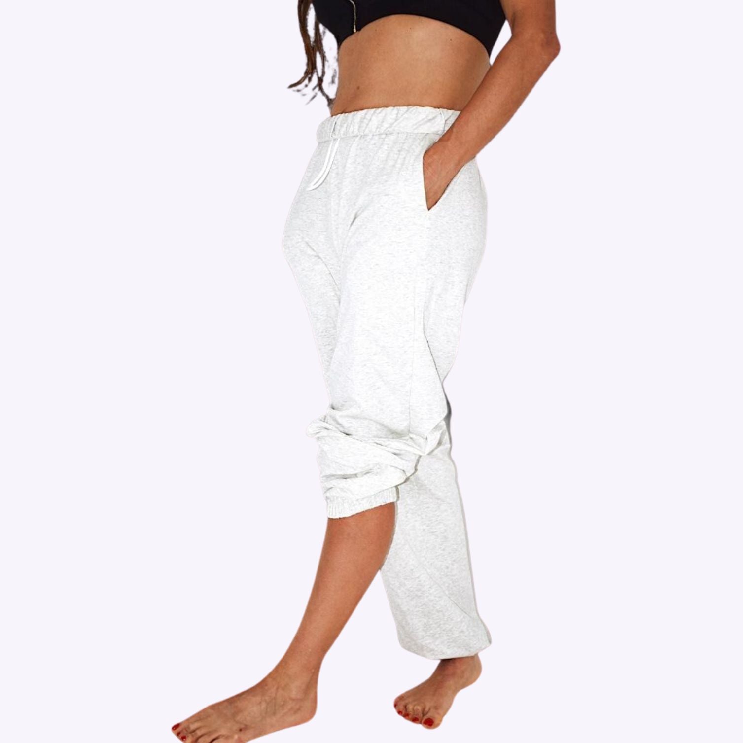 loose sweatpants for women in white grey colour slight dropcrotch side pockets and drawstring waist, ankles are elastic for cuffing and adjusting length