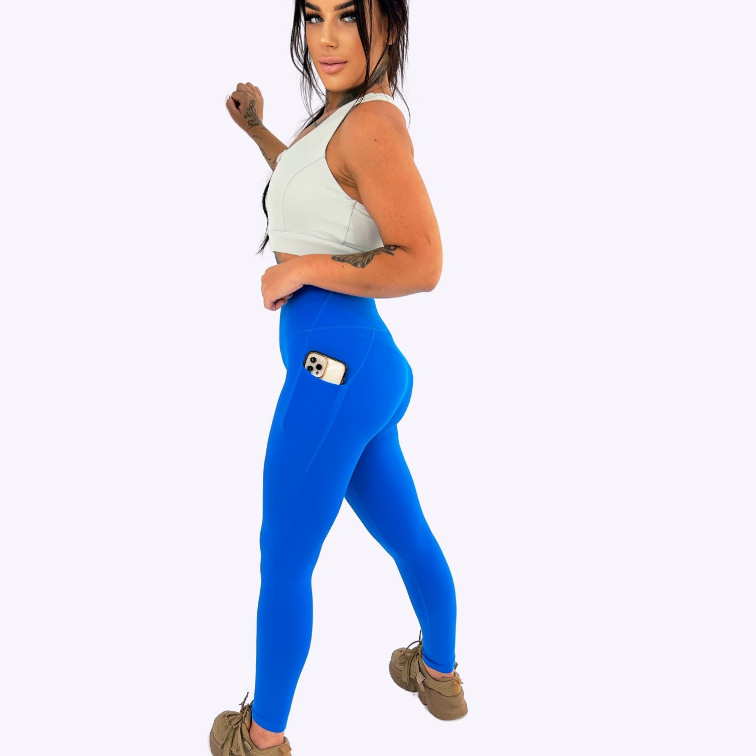 women's skins, blue highwaisted compression leggings with side pockets for phone