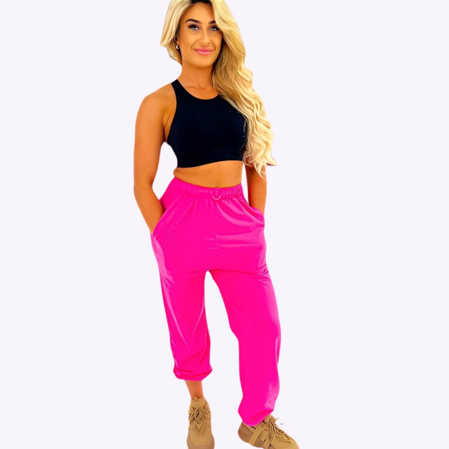 pink track pants for women with drop crotch, drawstring waist, elastic cuffed ankles and oversized look