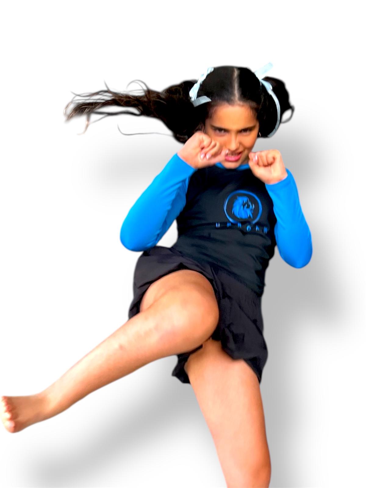 non-slip rashie, kids bjj gear, long sleeve rashie with silicone hem, blue sleeve rashguard, rashguard for rolling, kids rashie with blue sleeve, no roll-up rashie