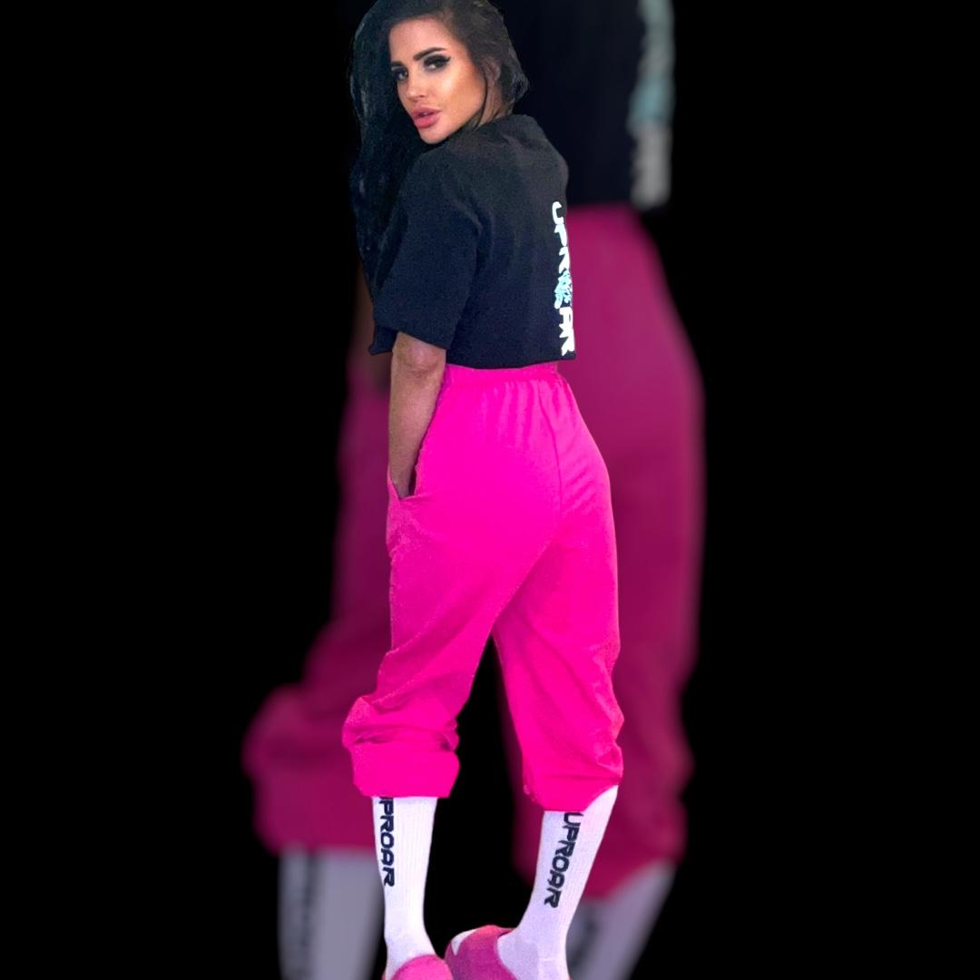 pink track pants for women with drop crotch, drawstring waist, elastic cuffed ankles and oversized look