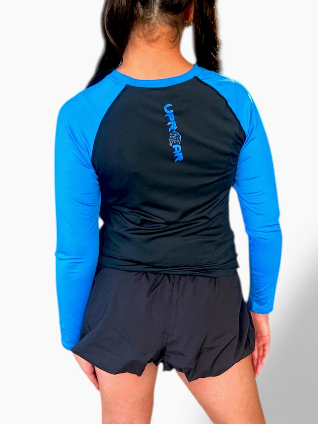 non-slip rashie, kids bjj gear, long sleeve rashie with silicone hem, blue sleeve rashguard, rashguard for rolling, kids rashie with blue sleeve, no roll-up rashie