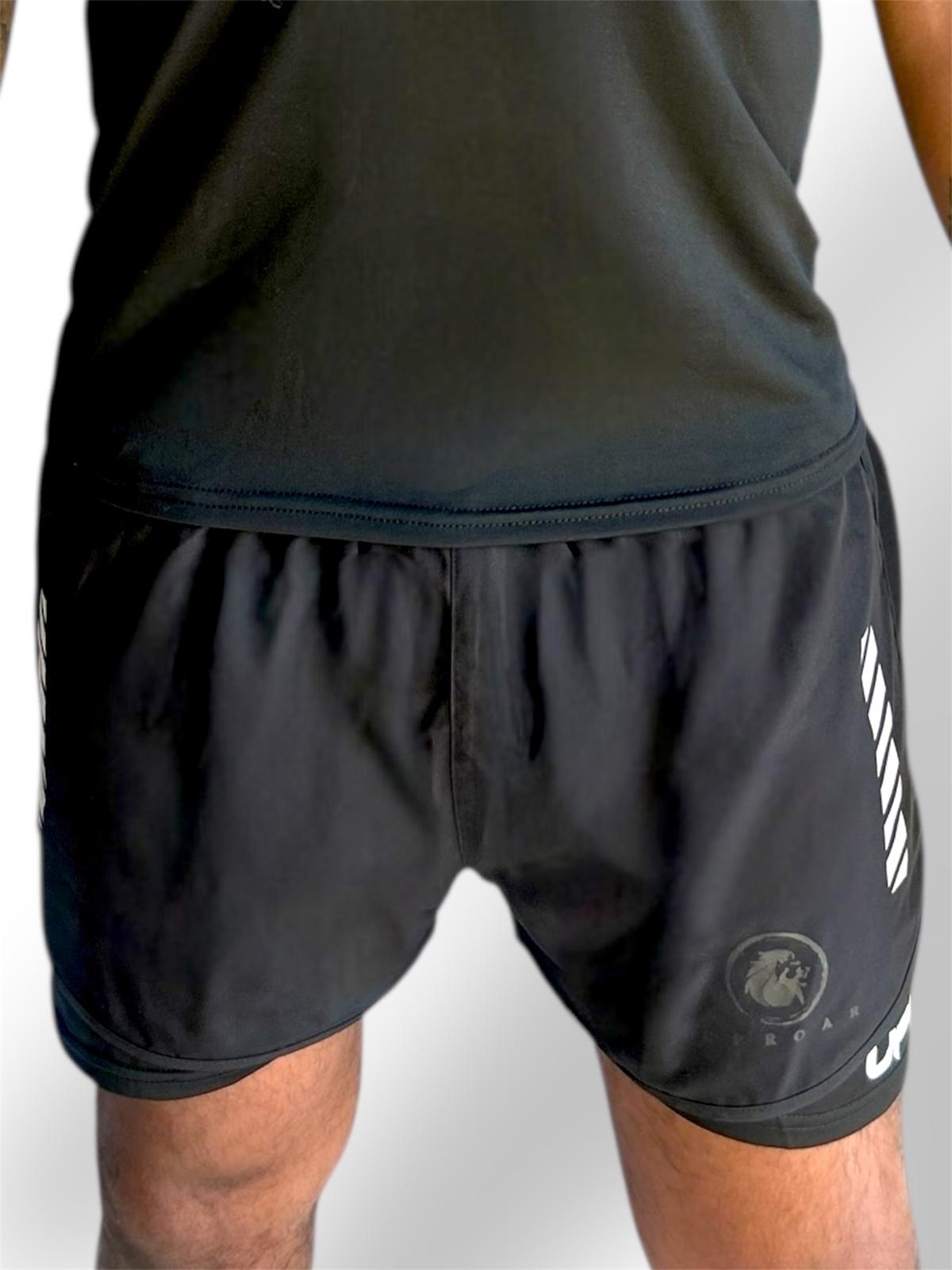 mens black 2n1 training shorts, lightweight with drawstring and elastic waist, no pockets or zips for use in combat training, reflective logo for visibility at night